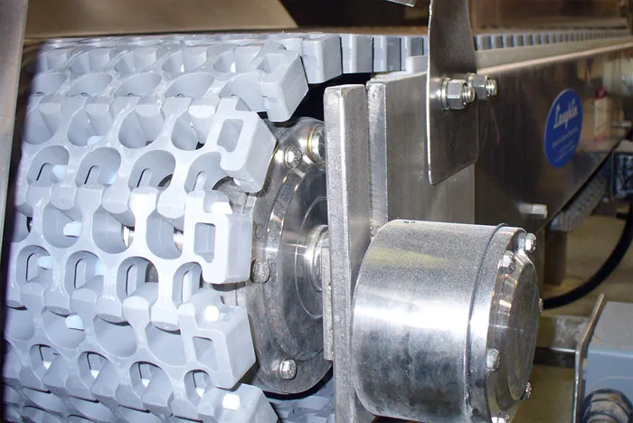 Conveyor section with a fabricated stainless drive housing