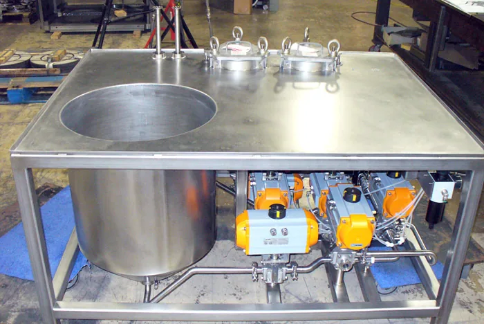 Stainless skid with tank, valves and actuators