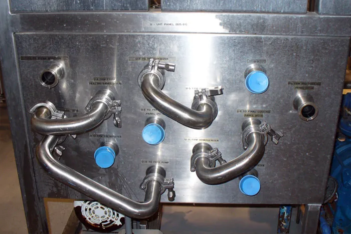 Stainless panel with bent tube connections