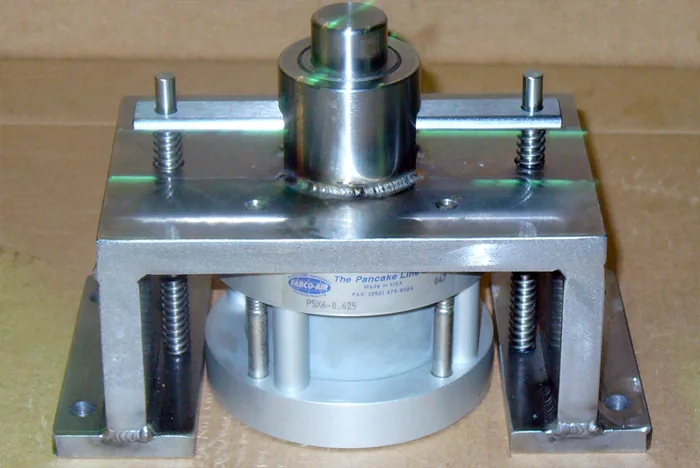 Machined fixture assembly on a base plate