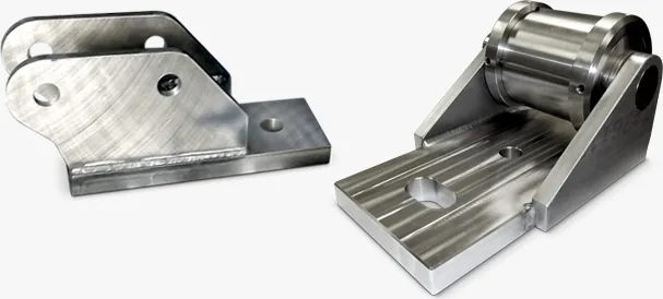 Machined brackets and housing parts